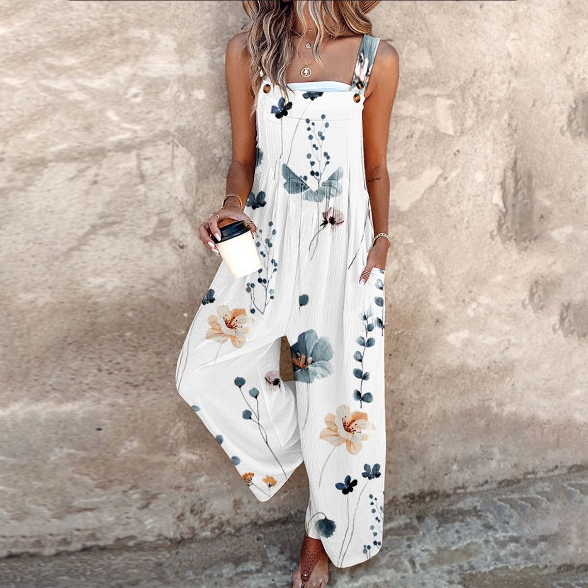 AMALIA | Lange Mouwloze Jumpsuit met Bloemenpatroon en Zomerse Comfort