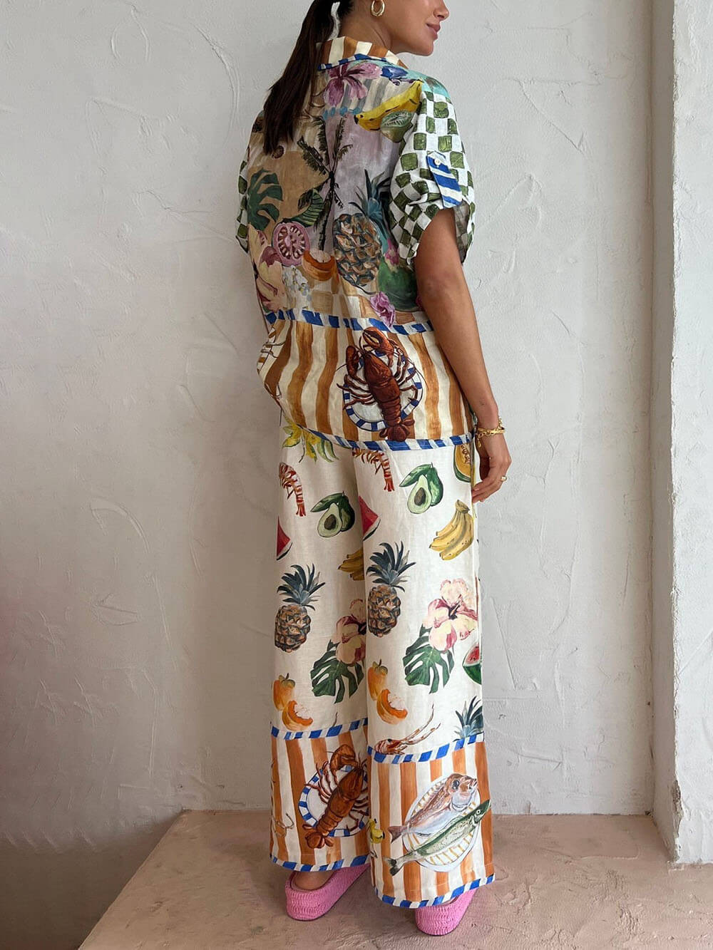 Tropical jumpsuit met wijde pijpen