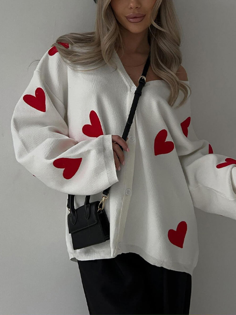 Gebreide cardigan met geborduurd hart